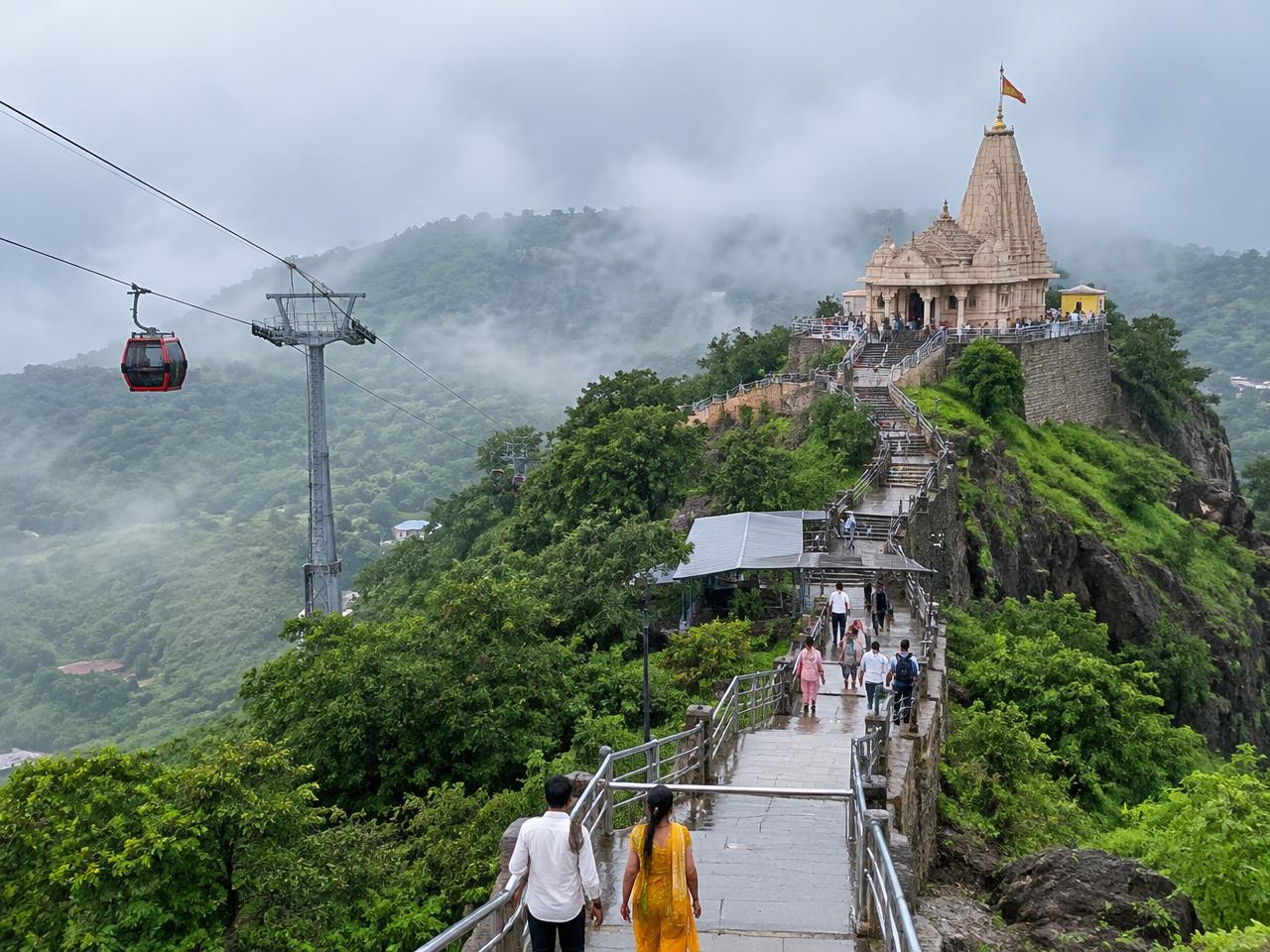 A hilltop temple reached by steps and a ropeway